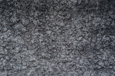 Black cracked cement texture background.の写真素材