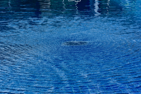 Water lisp in the swimming pool.の写真素材