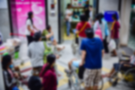 Patients waiting treatment in the waiting area at the hospital blurred.の写真素材