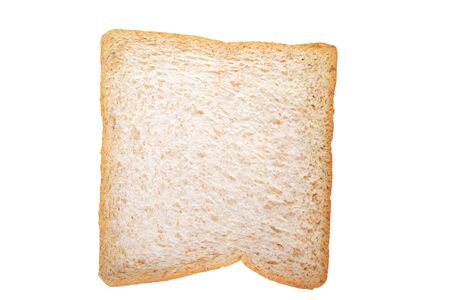 A slice of whole wheat bread isolated on white backgroundの写真素材