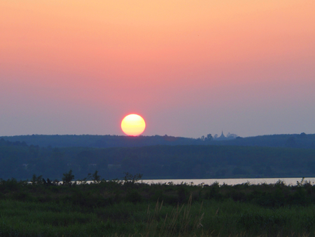 nice sunset on a mountain lakeの写真素材