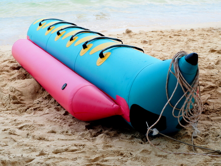 banana boat lays on a beachの写真素材