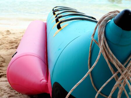 banana boat lays on a beachの写真素材