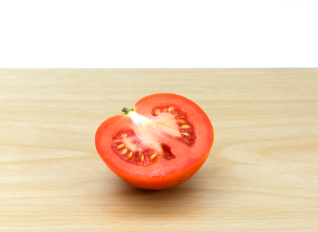 fresh tomatoes on wooden background.の写真素材