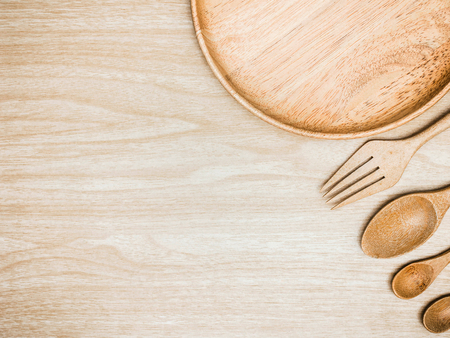 Utensil Kitchen Wooden and stainless whisk for cooking on wooden background. Top view white copy space.の写真素材
