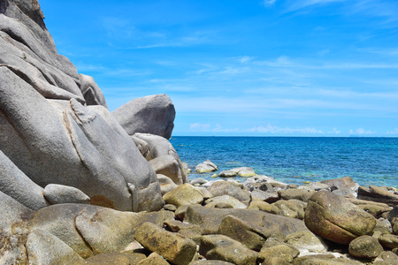 The stone on the beach with blue sea at Koh Chang island in Thailandの写真素材