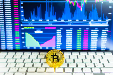 Gold bitcoin and trading chart background. Virtual currency concept.の写真素材