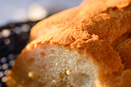 Close-Up Of Delicious Loaves Of Traditional Homemade Bread In Blue Wooden Basketの写真素材