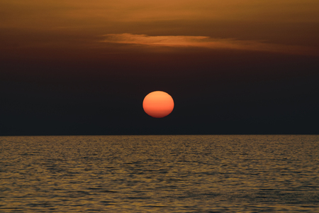 Scenic View Of Sunset Over Calm Ionian Sea Against Skyの写真素材