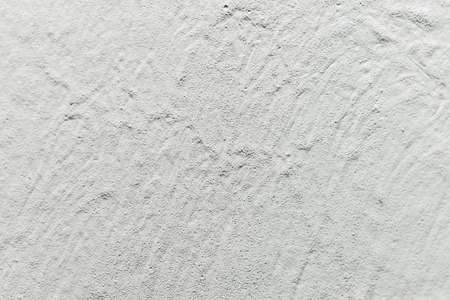 Textured Background Of White Wall With Small Holesの写真素材