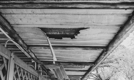 the broken silver ceiling in the Rama 9 public park was rendered in black and white color.の写真素材