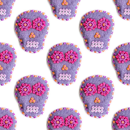 Sugar skull. Seamless pattern with Day of the Dead symbol. Felted skull with embroideryの写真素材