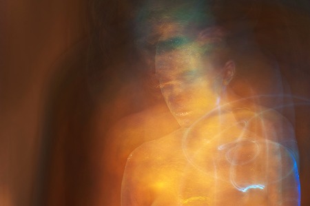 Young woman portrait. Shape and fit body beauty studio shoot. Perfect makeup on beautiful face of white model with blonde hair. Beautiful girl. Posing fashion model. Mixed light artの写真素材