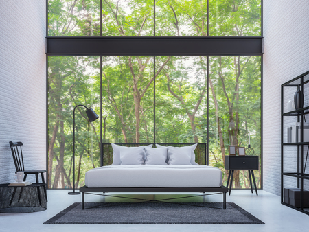 Modern loft bedroom with nature view 3d rendering image Furnished with Black steel furniture has white brick walls and large windows look out to nature.の写真素材