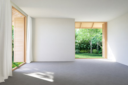 Modern contemporary loft empty room with tropical garden view 3d render The Rooms have concrete floors ,wooden plank ceiling open wooden doors to see fresh green nature.の写真素材