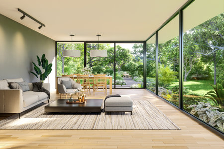Modern contemporary style living and dining room with large window overlooking tropical green nature garden background 3d render illustrationの写真素材
