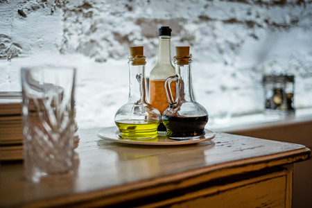 bottles with sauces in a restaurantの写真素材