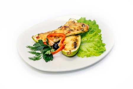 Vegetable stack - pumpkin, zucchini, red capsicum, eggplant and mushroom cooked in a tomato, onion, and garlic sauce topped with parmesan cheeseの写真素材