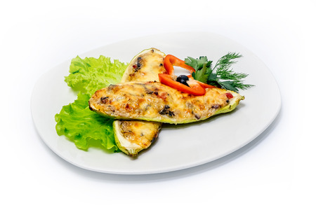 Vegetable stack - pumpkin, zucchini, red capsicum, eggplant and mushroom cooked in a tomato, onion, and garlic sauce topped with parmesan cheeseの写真素材