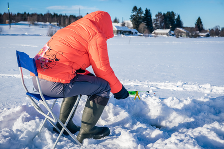 girl on winter fishingの写真素材