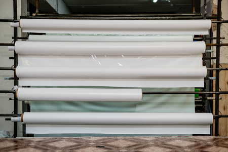 white vinyl rolls on the shelves