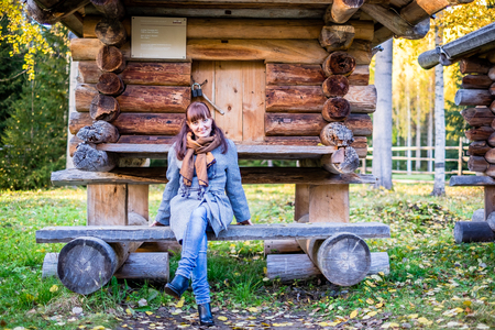 the girl is resting on a benchの写真素材