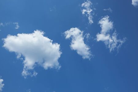 White clouds in the blue skyの写真素材