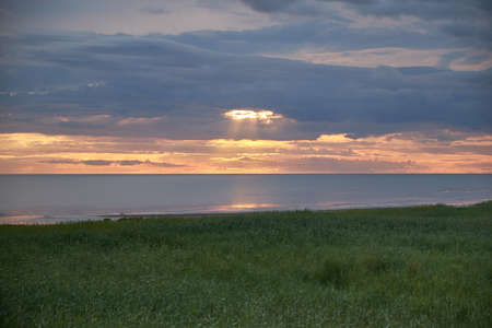 Sunset on the shore of the White Sea.の写真素材