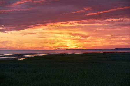 Sunset on the shore of the White Sea.の写真素材