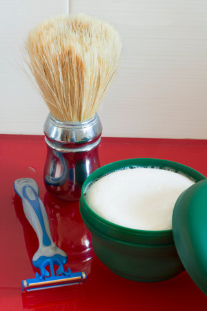 Set of tools to shave flat on the shelf of the bathroom sinkの写真素材