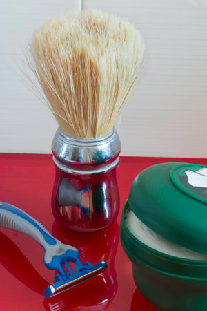 Set of tools to shave flat on the shelf of the bathroom sinkの写真素材