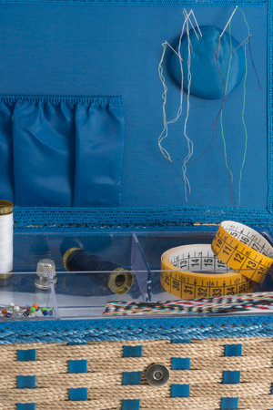 Details of a blue box containing a set of tools for hand sewingの写真素材