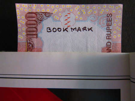 MONEY USED AS BOOKMARK の写真素材