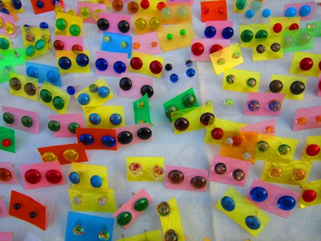 MANY EARRINGS OVER WHITE BACKGROUND の写真素材