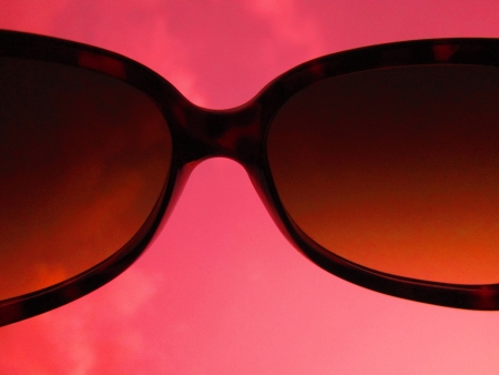 black glass and red backgroundの写真素材