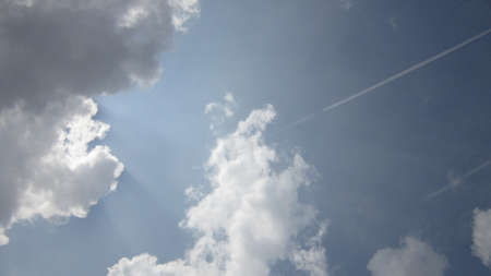 JET PLANES IN CLOUDY MONSOON SKY