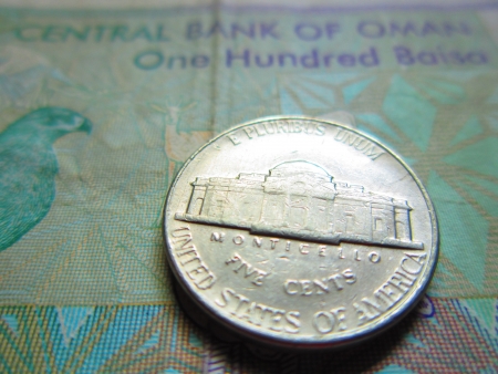 american cent on oman money-international relationship
