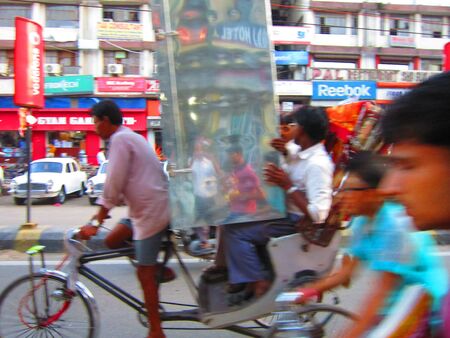CYCLE RICKSHAW CARRYING A HUGE STEEL TRUNK. SHOT AT PATNA, BIHAR, INDIA, ASIA AT0601 PM ON 27.08.12
