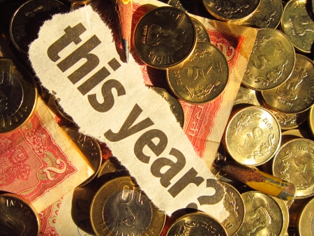 THIS TEAR WORD WRITTEN AMONG COINS