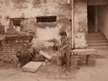 A GIRL WITH HER DOG. SHOT AT MORNING HOURS ON 03 NOVEMBER 2012 AT  PATNA, BIHAR, INDIAのeditorial素材