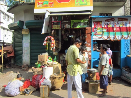 PEOPLE ACTIVITIES IN FRONT OF A SHOP.SHOT AT CALCUTTA, INDIA: AFTERNOON HOURS ON NOVEMBER 18,2012.のeditorial素材