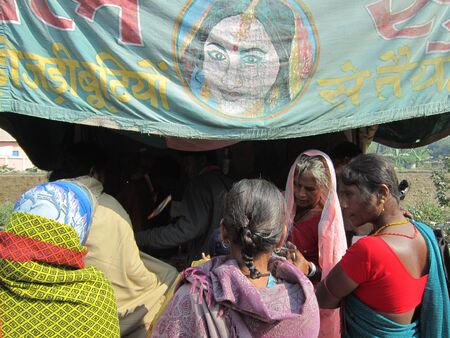 WOMAN PURCHASING GOODS.SHOT DURING AFTERNOON HOURS ON 02.12.12 AT SONEPUR FAIR, SONEPUR, BIHAR,...