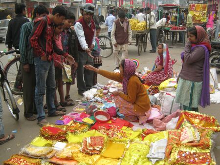 UNIDENTIFIED PEOPLE DO BUSINESS DURING HINDU FESTIVAL. SHOT ON MORNING HOURS ON FEBRUARY 15, 2013 AT PATNA, BIHAR, INDIA.のeditorial素材