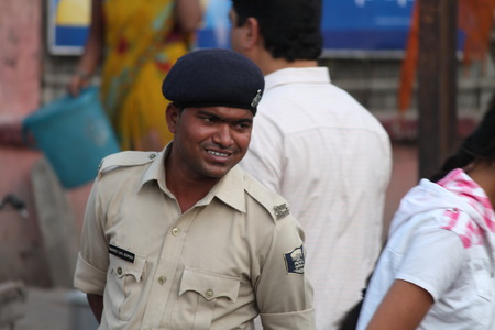 Police on duty smiling Shot at afternoon hours on March 26, 2014 at Patna, Bihar, India のeditorial素材