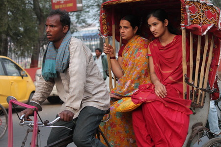Travel In Indian rickshaw. Shot at Gandhi Maidan, Patna, Bihar at afternoon hours on 19.02.2015.