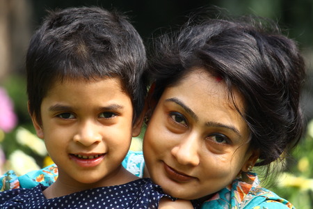 Indian woman with daughter.の写真素材
