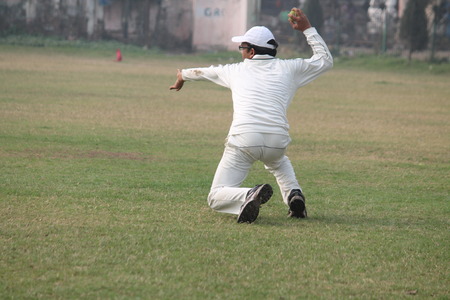 Reserve Bank of India Officers play friendly cricket. Shot at morning hours on 21.02.2015 at Patna, Bihar, India.のeditorial素材