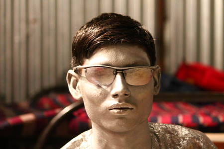 Indian woman change cloth after bath at Garga Dam. Shot at afternoon hours at Bokaro, Jharkhand, India on 26.02,2015.のeditorial素材