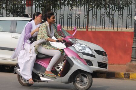 Unsafe driving. Street photo, Shot at Gandhi Maidan, Patna, Bihar, India on 20.02.15 at afternoon hours.のeditorial素材
