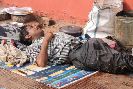 Indian poor at foot path. Street photo, Shot at Gandhi Maidan, Patna, Bihar, India on 25.02.15 at...